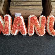 Lettering with carnation centres